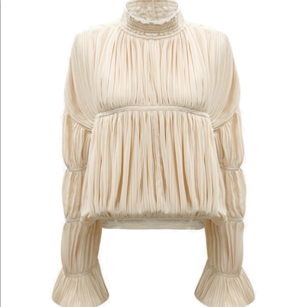 Luxurious gathered top in ivory color